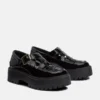 Sapatos femininos de plataforma com fivela em couro envernizado Stone Street Sapatos femininos de plataforma com fivela em couro envernizado Stone Street